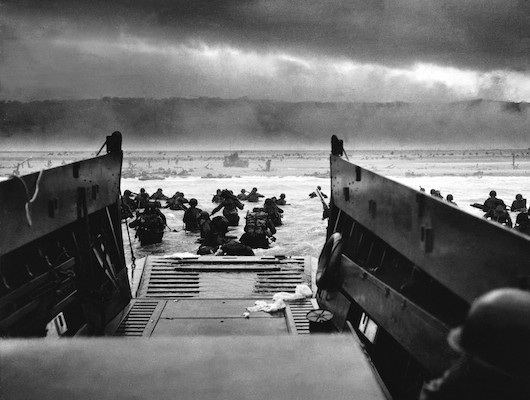 photo of Soldiers storming the beach on D-Day