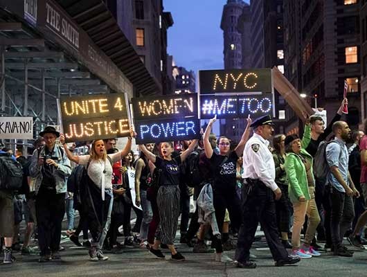 Protesters march through Midtown Manhattan as they rally against Supreme Court nominee Judge Brett Kavanaugh, Oct. 1, 2018 in New York.Drew Angerer / Getty Images