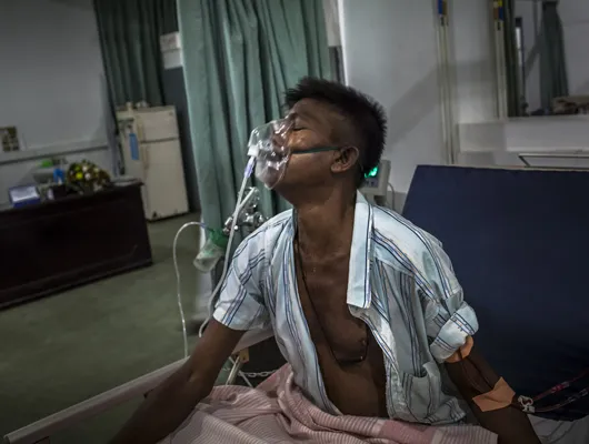 man with oxygen mask on his face