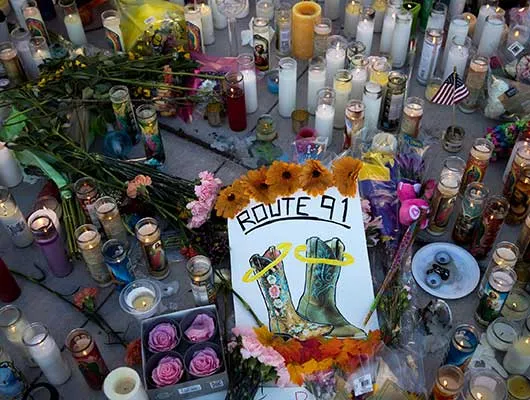 A makeshift memorial for the victims of Sunday night's mass shooting stands at an intersection on the north end of the Las Vegas Strip, Oct. 3, 2017, in Las Vegas, Nevada. 