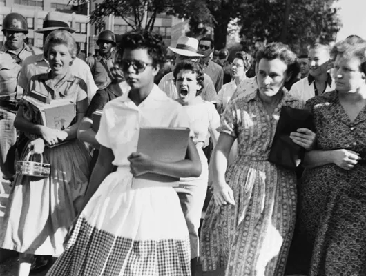White students jeering a Black female student