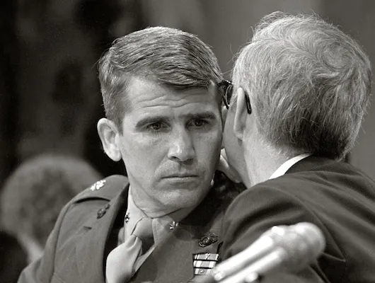 Convicted felon Oliver North