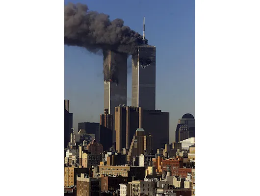 The twin towers of the World Trade Center burn on Sept. 11, 2001