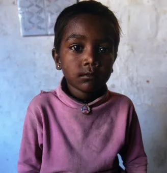 child looking at camera